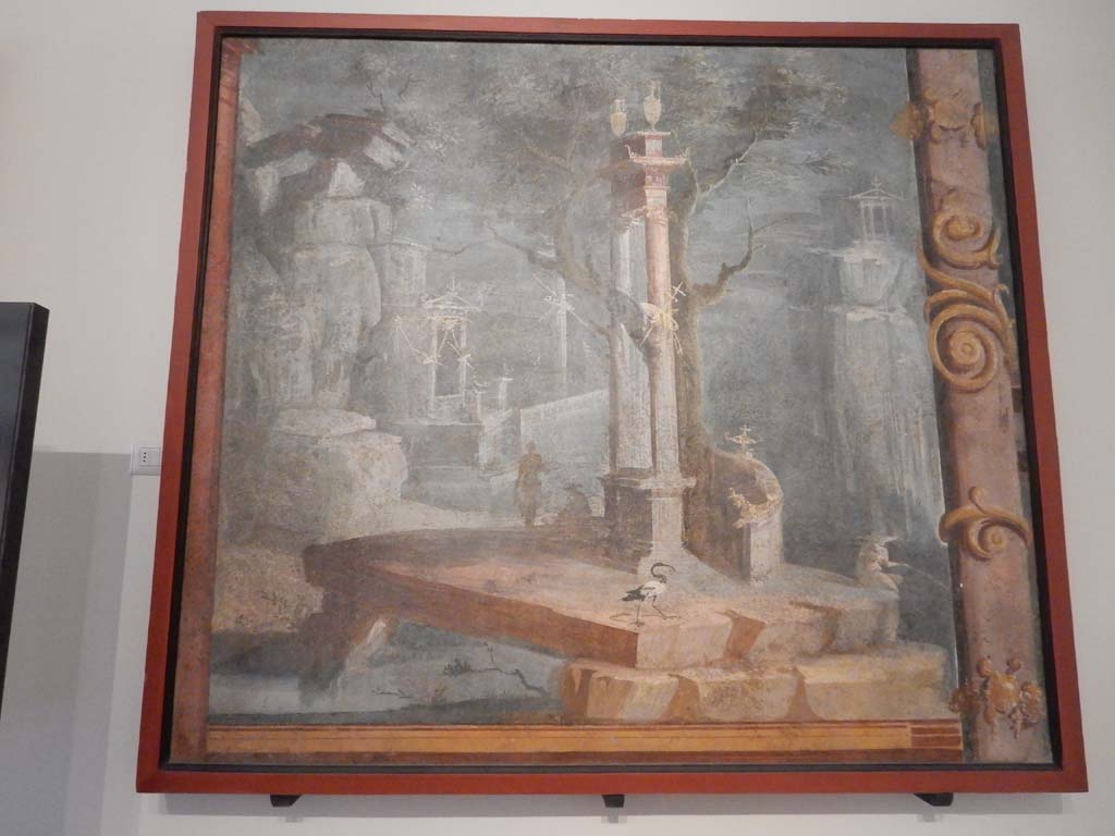 VIII.7.28 Pompeii. June 2019. 
Painting of rocky landscape with little temples, statue, fisherman and ibis, found on the left area of the north wall of Ekklesiasterion.
Photo courtesy of Buzz Ferebee.
