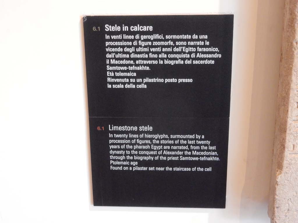 VIII.7.28 Pompeii. June 2019. Museum card with details of Limestone stele with twenty lines of hieroglyphs.
Photo courtesy of Buzz Ferebee.
