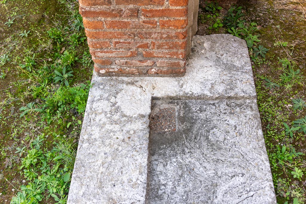 VIII.7.28 Pompeii. October 2023. Looking towards south end of doorway threshold of cella. Photo courtesy of Johannes Eber.