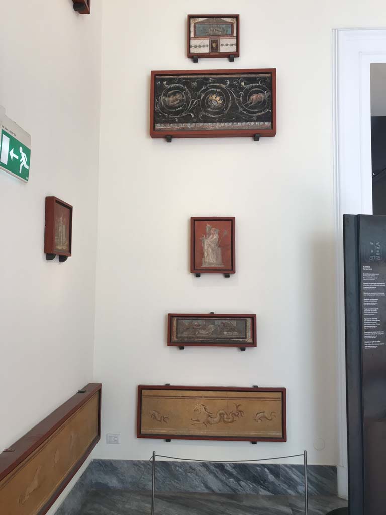 VIII.7.28 Pompeii. April 2019. Arrangement of paintings from east wall of portico.
Photo courtesy of Rick Bauer.
