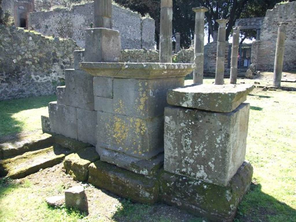 VIII.7.29 Pompeii. March 2009.  East side of Table, pedestal and steps on south side of the Colonnade.