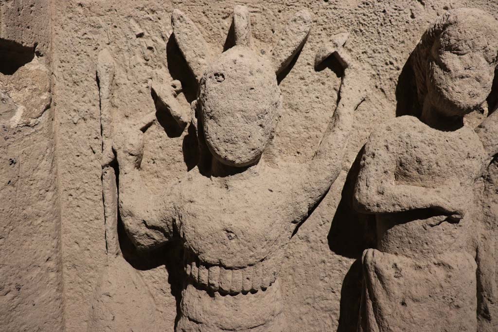 VIII.7.31 Pompeii, February 2021. Detail of Athena, with shield, spear and holding tools, maybe hammer, on display in Antiquarium. 
Photo courtesy of Fabien Bièvre-Perrin (CC BY-NC-SA).
