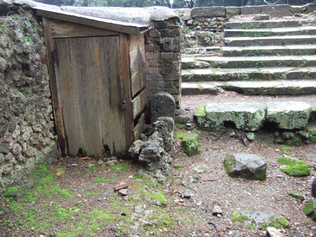 VIII.7.34 Pompeii. December 2005. South-west corner of tomb with steps to Temple outside.