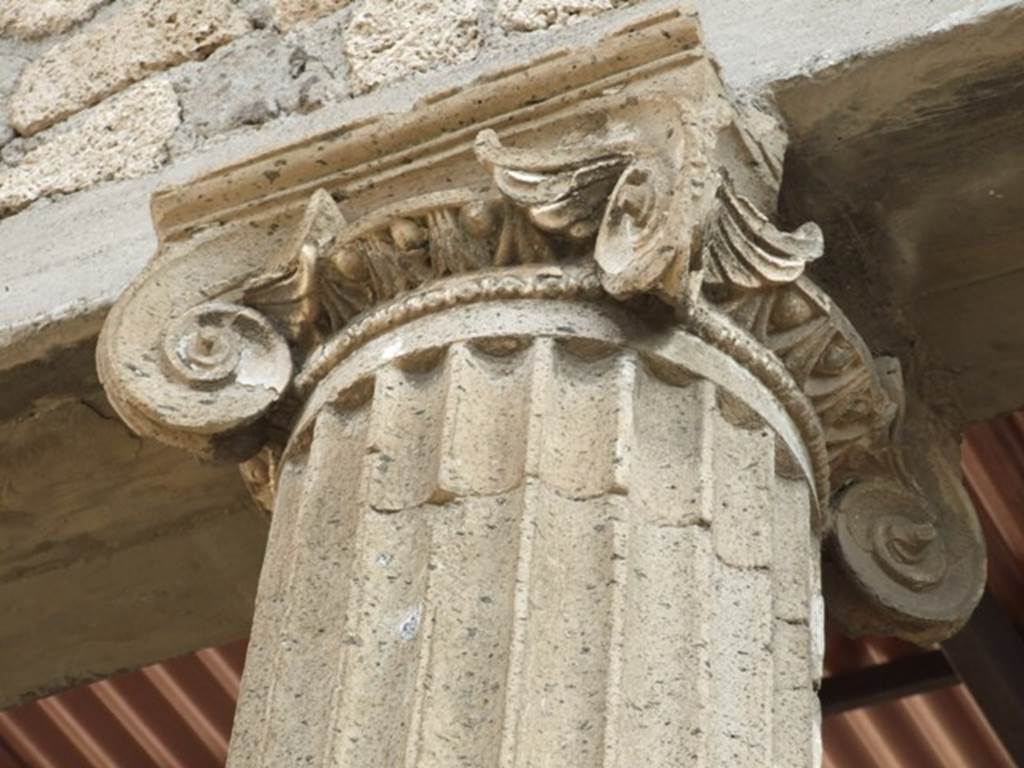 IX.1.20 Pompeii.  December 2007.  Room 2.  Atrium.  East Side. Ionic column capital.