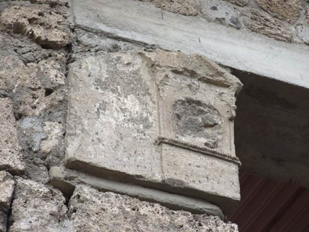 IX.1.20 Pompeii. December 2007. Room 2,  west side of atrium.
Damaged front face of capital from south-western corner.

