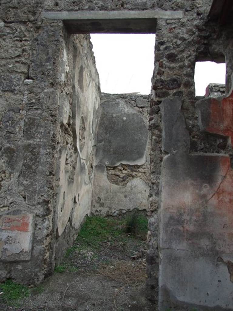 IX.1.22 Pompeii. December 2007. Doorway to room 4, triclinium in south-east corner of atrium.