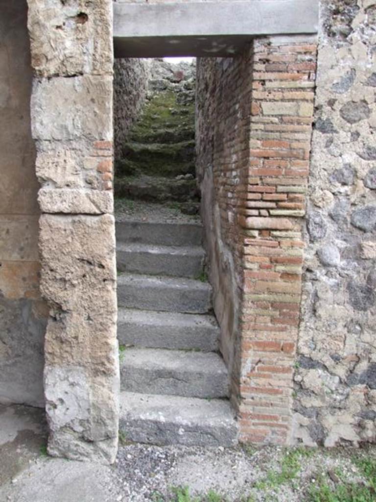 IX.1.22 House of M. Epidi Sabini. December 2007. Stone staircase between rooms 25 and 28.