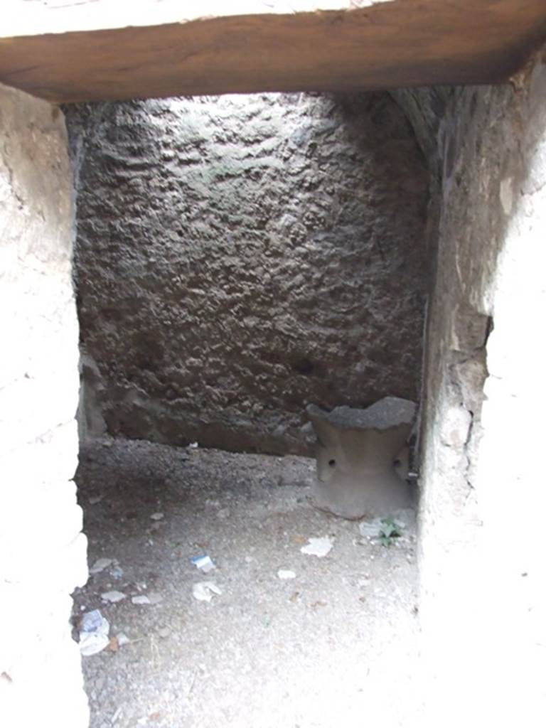 IX.1.22 Pompeii. December 2007. Room 29, doorway into bakery workshop for the working of the bread, with barrel-vaulted ceiling and square window at its east end.
