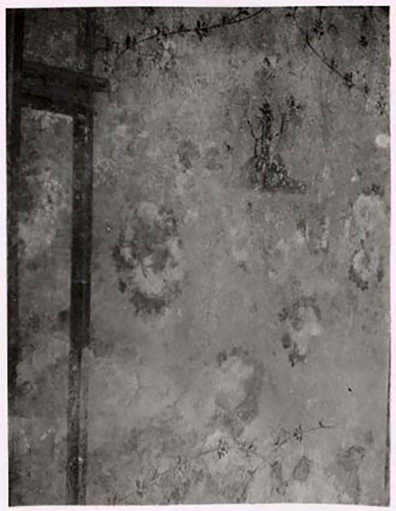 IX.2.10 Pompeii. Pre-1943. Tablinum, central painting on east wall. Photo by Tatiana Warscher.
Described by Warscher as –
“The central painting of the wall was a pair of columns joined by their lintel on which an urn was placed: 
in the middle of the two columns the raised branch of a sacred tree passed. 
To the right stands a circular tower with an order of windows at the top.”
See Warscher, T. Codex Topographicus Pompeianus, IX.2. (1943), Swedish Institute, Rome. (no.31.), p. 68.
