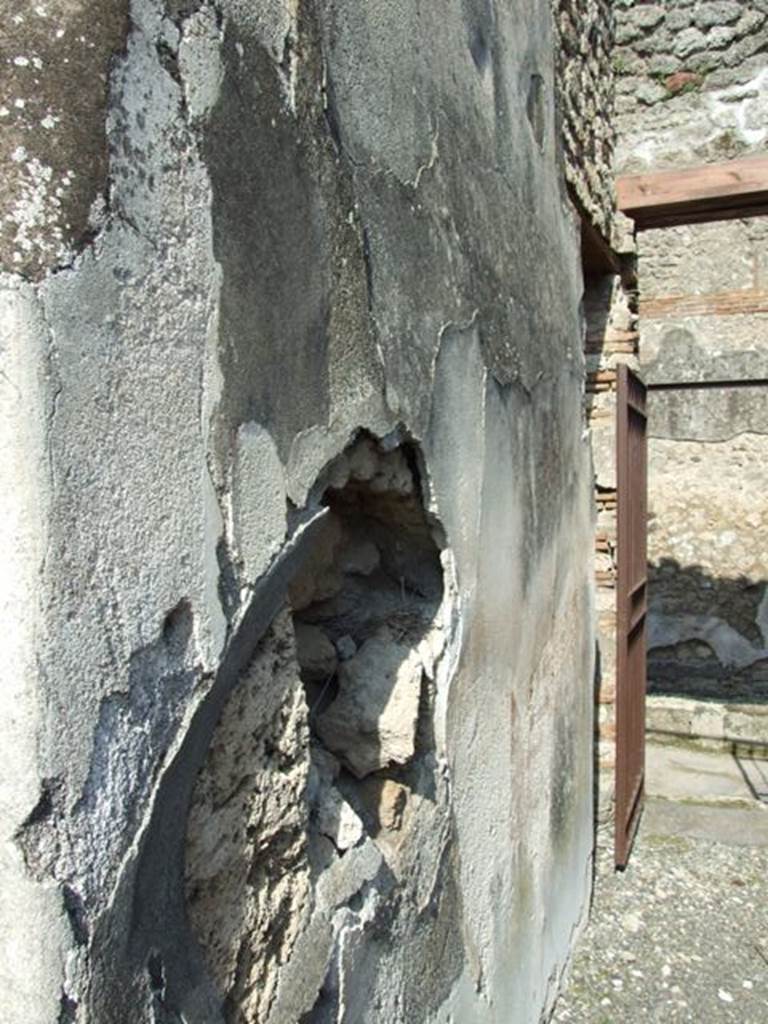 IX.2.18 Pompeii. March 2009. North wall of entrance corridor. At the east end of the north wall is a doorway, which would have led to stairs to the upper floor.

