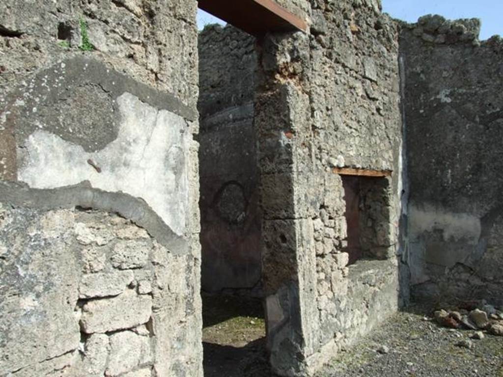 IX.2.18 Pompeii. March 2009. Doorway and window to room 3, triclinium or cubiculum.
According to Fiorelli, and PPM, this room was a triclinium.
See Fiorelli, G: Descrizione di Pompei, 1875, (p.385).
According to PPP, and Eschebach, this room was a cubiculum.
See Bragantini, de Vos, Badoni, 1986. Pitture e Pavimenti di Pompei, Parte 3. Rome: ICCD. (p.419)
See Eschebach, L., 1993. Geb�udeverzeichnis und Stadtplan der antiken Stadt Pompeji. K�ln: B�hlau. (p.409)
