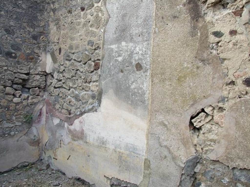 IX.2.21 Pompeii. March 2009. Room 5, north wall. According to Bragantini, the walls in this room would have had a yellow dado. The middle zone would have had a yellow central panel, with red side panels.
See Bragantini, de Vos, Badoni, 1986. Pitture e Pavimenti di Pompei, Parte 3. Rome: ICCD. (p.423, ambiente �f�)
