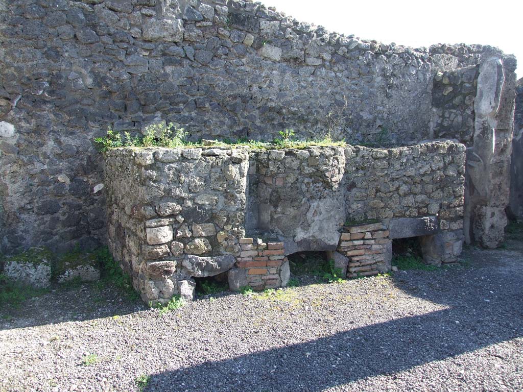IX.3.2 Pompeii. March 2009. Three masonry boilers against south wall of former atrium.