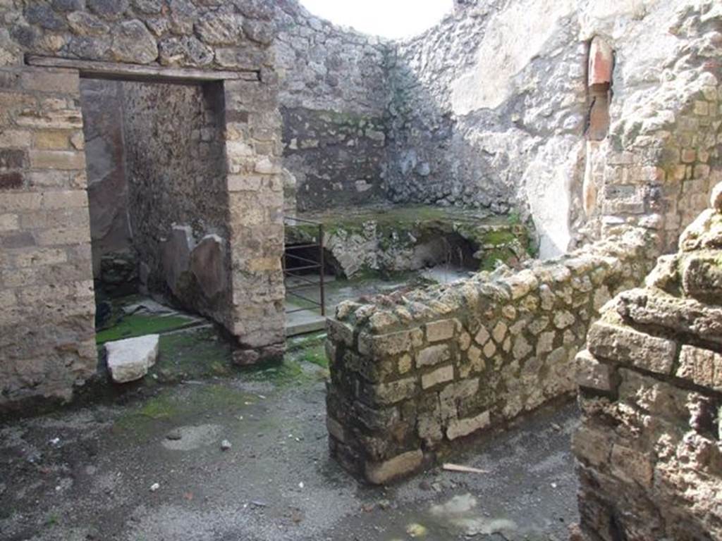 IX.3.5 Pompeii. March 2009. Room 7, looking west towards doorway into room 8, the kitchen area in room 9, and doorway to room 10.
