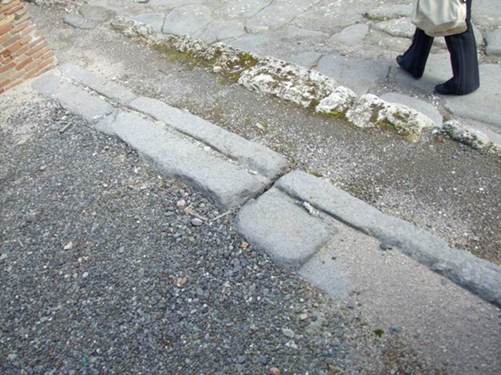 IX.3.13 Pompeii.  March 2009.  Sill at front of caupona, along the front of the vicolo.