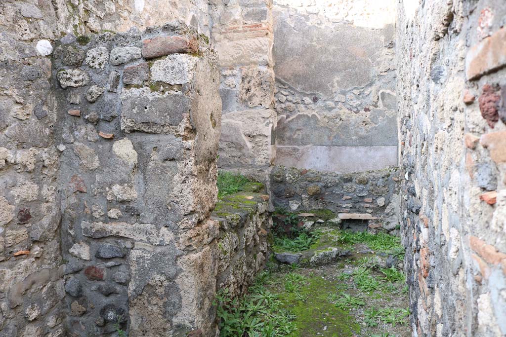 IX.3.14 Pompeii. December 2018. Looking north towards hearth and water reservoir. Photo courtesy of Aude Durand.