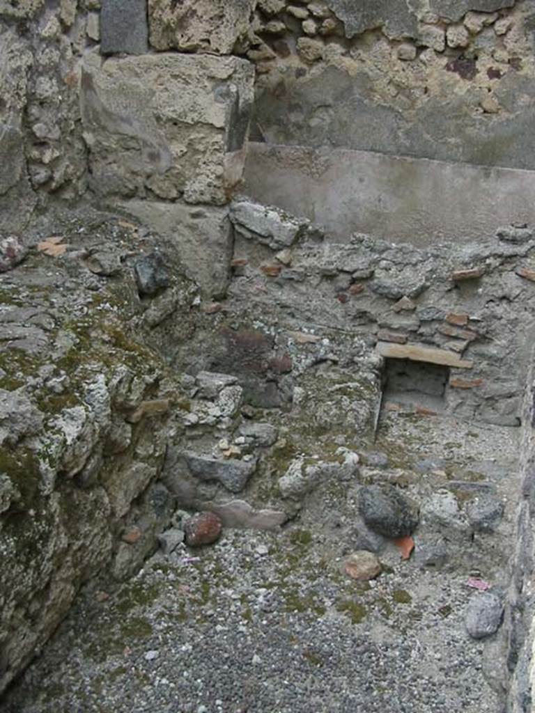 IX.3.14 Pompeii. May 2003. Hearth and water reservoir at north end of corridor.
Photo courtesy of Nicolas Monteix.
