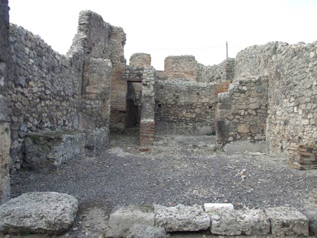 IX.3.17 Pompeii. March 2009. Looking north across workshop. According to Della Corte, a seal or stamp was found here with the name of Q. Sallusti(us) Invent(us).
See Della Corte, M., 1965.  Case ed Abitanti di Pompei. Napoli: Fausto Fiorentino. (p. 192, S.80)
