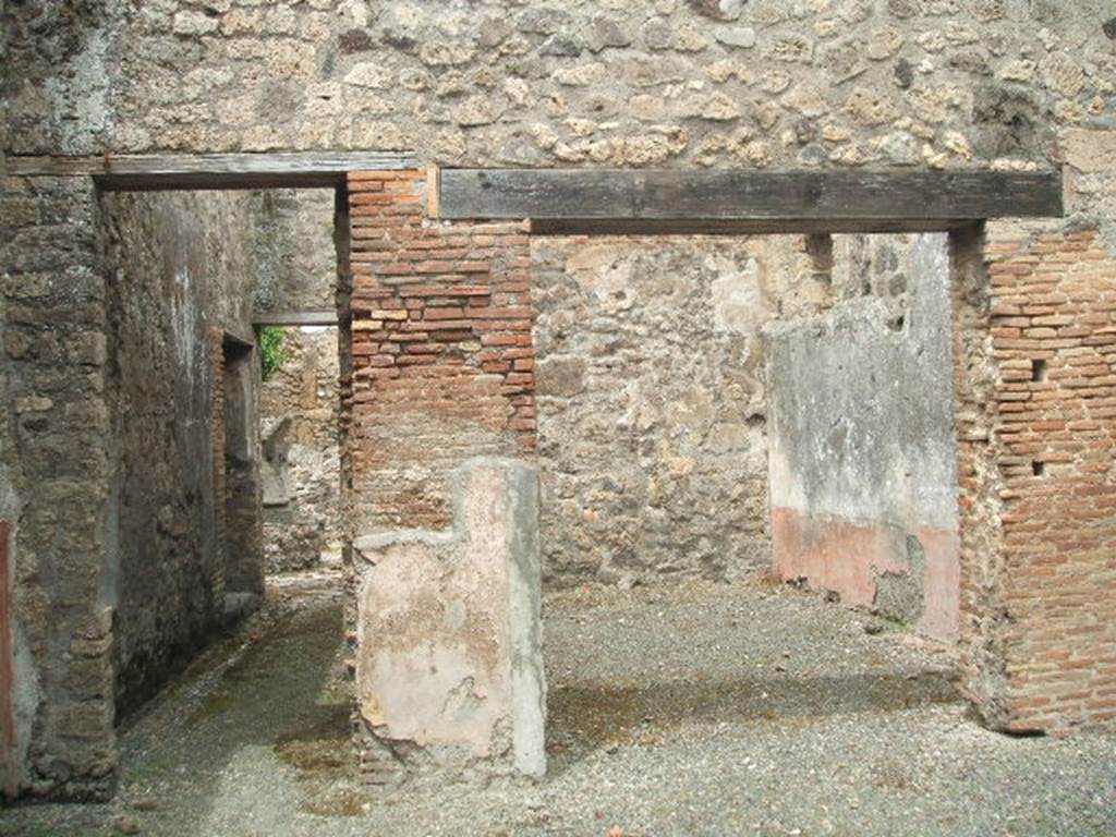 IX.3.19. Taberna T. Genialis.  May 2005.   Room 10.  Entrance to room 13 on right, and corridor to bakery on left.