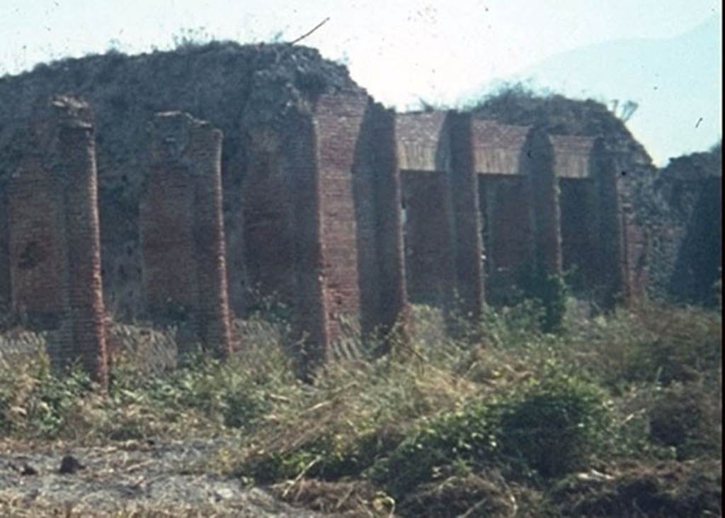 IX.4.18 Pompeii. Caldarium “s”. Looking east across palaestra “d”. 
Photographed 1970-79 by Günther Einhorn, picture courtesy of his son Ralf Einhorn.
