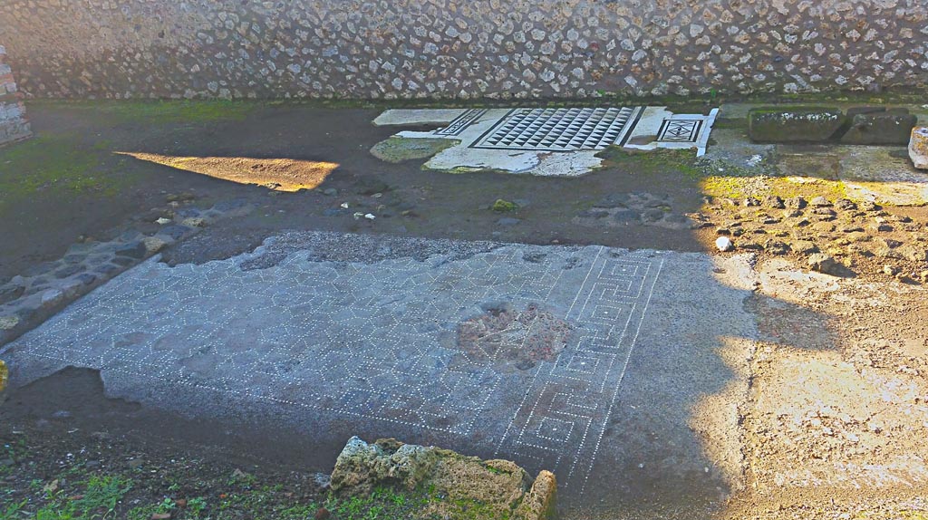IX.4.18 Pompeii. December 2019.
Mosaic flooring from earlier buildings, before the building of the Central Baths. Photo courtesy of Giuseppe Ciaramella.
