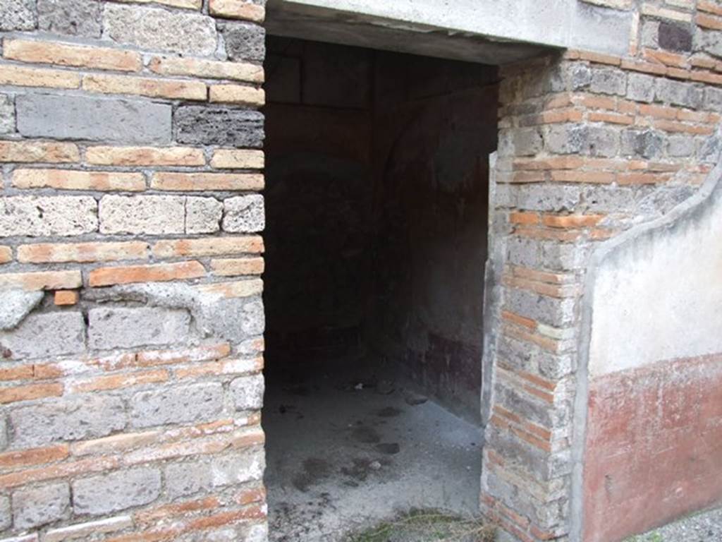 IX.5.6 Pompeii. December 2007. Doorway to room 7, on east side.
According to Sogliano, some of the paintings visible in this room on excavation were – Hera and her attributes - peacock and a globe and sceptre (no.91) Wall painting of Apollo and woman of his love, according to Sogliano “completely destroyed” (no.108). See Sogliano, A., 1879. Le pitture murali campane scoverte negli anni 1867-79. Napoli: (p.24, no.91 and p.27, no.108)