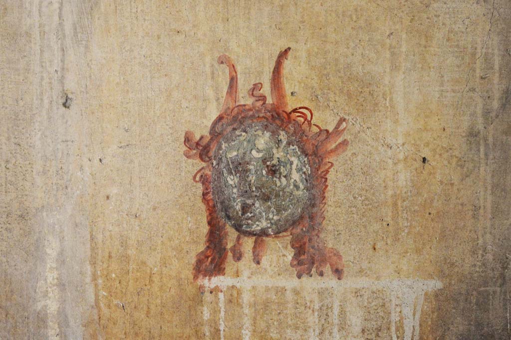 IX.5.6 Pompeii. May 2017. Room k�, painted mask from west wall at south end. 
Foto Christian Beck, ERC Grant 681269 D�COR.
