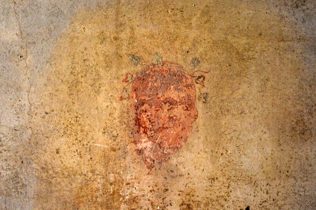 IX.5.6 Pompeii. May 2017. 
Room k�, west wall in centre, mask of a bald Silenus on a white background, with garland of ivy, and a pointed beard.
Foto Christian Beck, ERC Grant 681269 D�COR.
