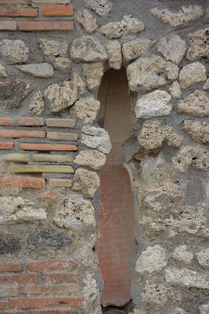 IX.5.8, Pompeii. May 2017. 
Looking south to terracotta downpipe , on pilaster between IX.5.8 and IX.5.7. 
Foto Christian Beck, ERC Grant 681269 D�COR.

