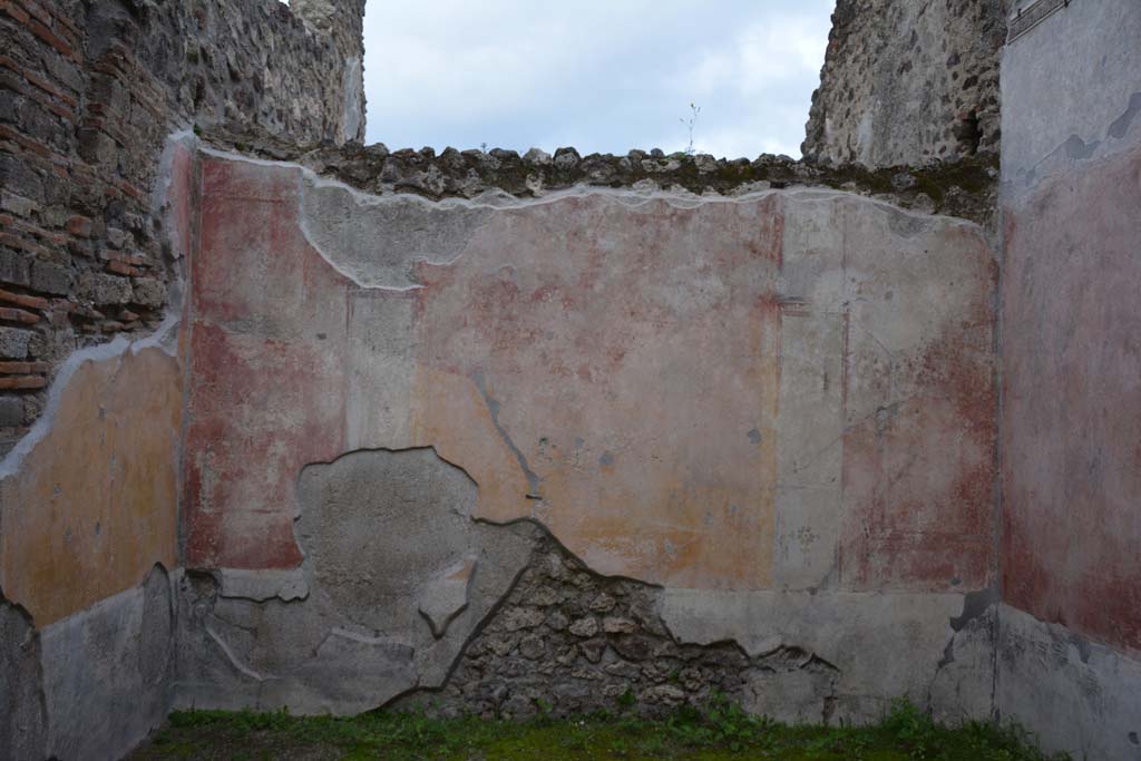 IX.5.9 Pompeii. March 2017. Room “p”, looking towards east wall.
Foto Christian Beck, ERC Grant 681269 DÉCOR.
According to PPM –
The east wall was decorated in IV style with panels with painted plants in a high black zoccolo, and in the middle zone, the central panel was yellow and the side panels were red, separated by architecture; the carpet borders on the side panels continued onto the nearby panels on the next wall in the manner to give the impression that large panels enclosed the entire room as a unit.
See Carratelli, G. P., 1990-2003. Pompei: Pitture e Mosaici. IX (9). Roma: Istituto della enciclopedia italiana, (p.525).