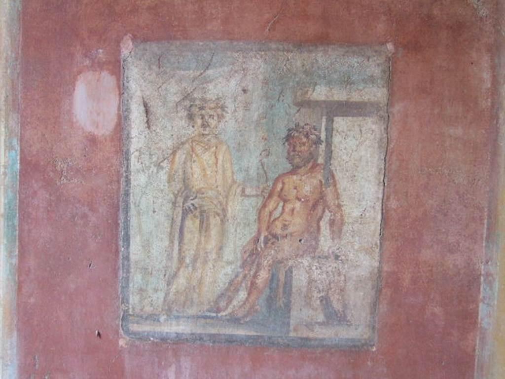 IX.5.14 Pompeii. May 2005. Cubiculum �g�, on south side of entrance doorway.
Wall painting of Hercules and Omphale, found on north wall.
See Bragantini, de Vos, Badoni, 1986. Pitture e Pavimenti di Pompei, Parte 3. Rome: ICCD. (p.483)
See Sogliano, A., 1879. Le pitture murali campane scoverte negli anni 1867-79. Napoli: (p.82, no.496)

