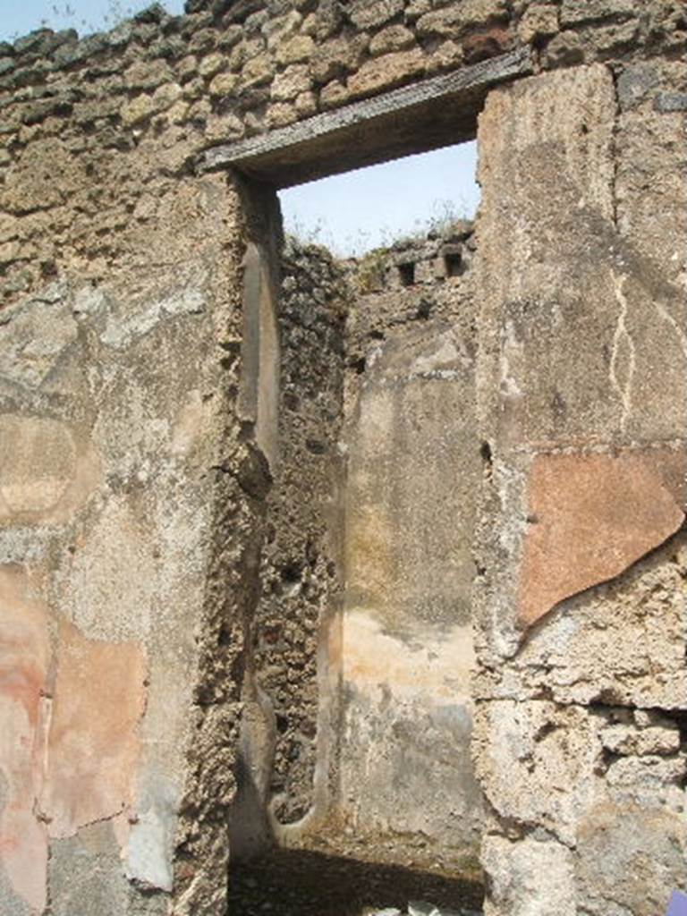 IX.6.5 Pompeii. May 2005. Doorway to Room on north side of atrium.