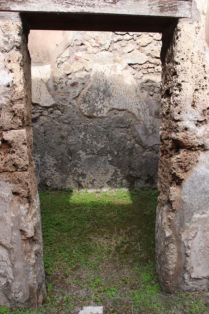 IX.7.19 Pompeii. October 2024. 
Room a, looking north through doorway. Photo courtesy of Klaus Heese.
