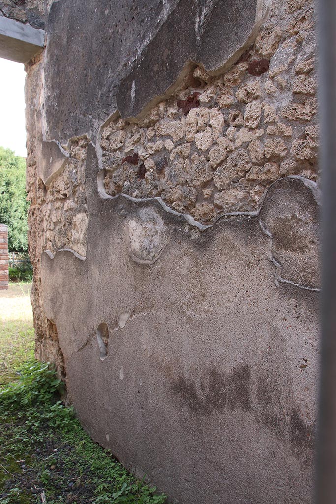 IX.7.20 Pompeii.  October 2024. 
Looking east along south wall of entrance corridor/fauces. Photo courtesy of Klaus Heese.
