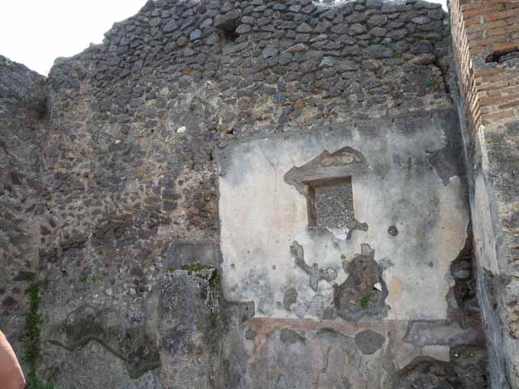 IX.8.2 Pompeii. May 2010. West wall of front and rear rooms.