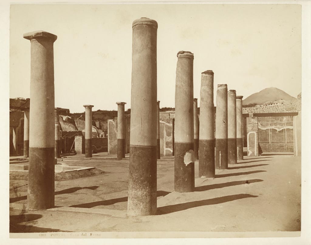 IX.8.6 Pompeii. Looking north along east portico towards doorway to room 11, on right.
Photograph No. 1283, by Giorgio Sommer, (1834-1914), described as Casa del Fauno.
Public domain, via Wikimedia Commons.