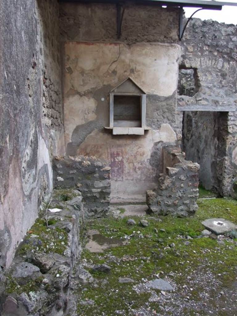 IX.8.6 Pompeii. March 2009. Room 23, Lararium in south east corner of Room 22, Atrium of servants quarters.