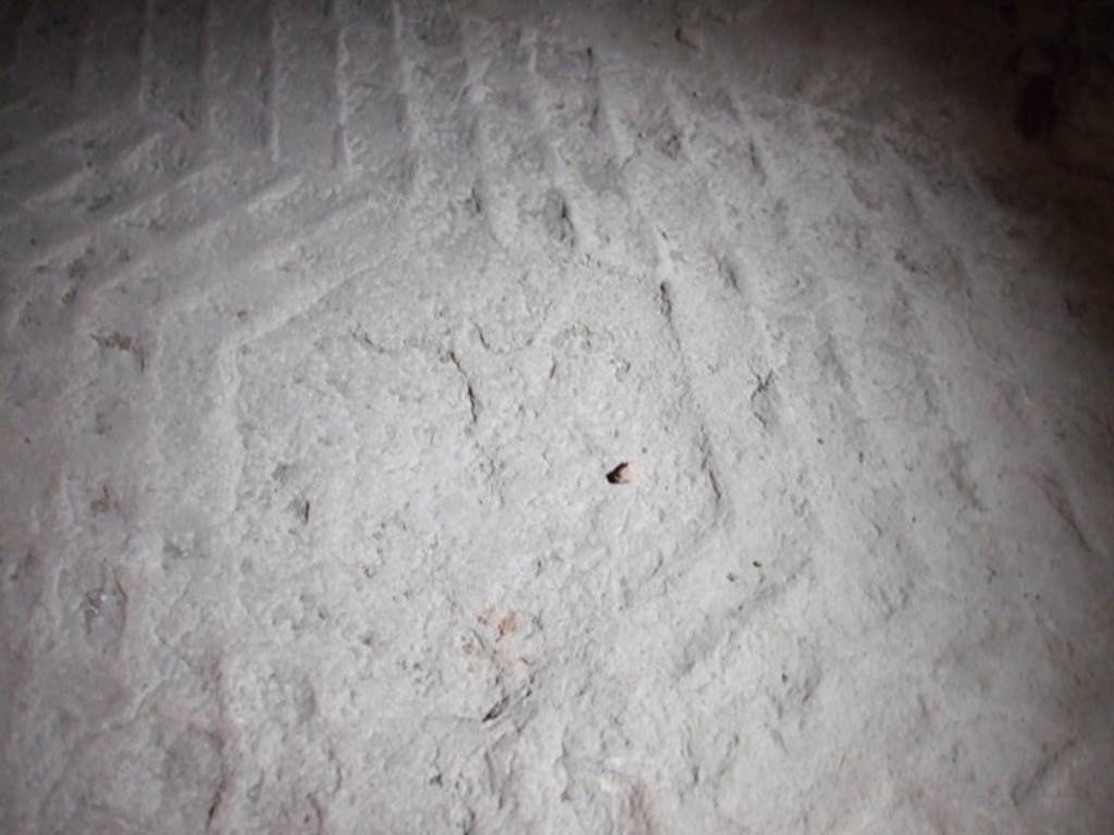 IX.8.6 Pompeii. March 2009. Room 34, remains of outline of flooring. The floor of opus sectile formed of diamond-shaped marble slabs had been removed and carried away by ancient explorers. In the centre of the floor had been a hexagonal shape.