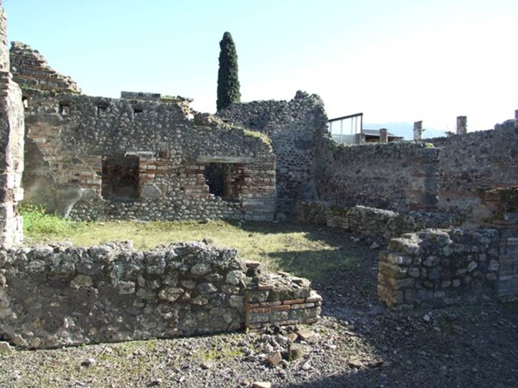 IX.9.a Pompeii. March 2009. Looking south across north portico and garden. Under the portico of the peristyle, at the base of the brick wall that connected the pillars, small piles of construction materials, i.e brick and lime pesto were found. See Notizie degli Scavi, 1888, p.515