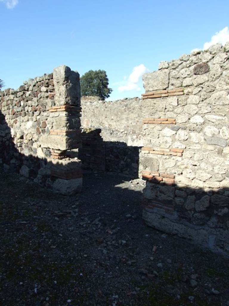 IX.9.a Pompeii. March 2009. Entrance doorway. According to Della Corte, CIL IV 3820 was found in the vicolo between Insula VIII and IX, and not at IIX.8.4. See IX.8.4 and see Della Corte, M., 1965.  Case ed Abitanti di Pompei. Napoli: Fausto Fiorentino. (p.131). According to Cooley, a translation of graffito CIL IV 3820, found at IX.8.4 was -
Neighbours beg you to elect Tiberius Claudius Verus (duumvir) with judicial power. Aemilius Celer wrote this.   [CIL IV 3820]
She also thought CIL IV 3790 and CIL IV 3794 were both found here �
Publius Aemilius Celer   [CIL IV 3790]
Aemilius Celer lives here [CIL IV 3794]
See Cooley, A. and M.G.L., 2004. Pompeii : A Sourcebook. London : Routledge. (p.126) 
