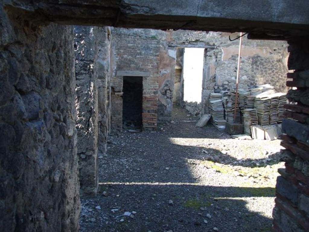 IX.9.d Pompeii. March 2009. Looking north across west side of atrium b, from doorway of room h.