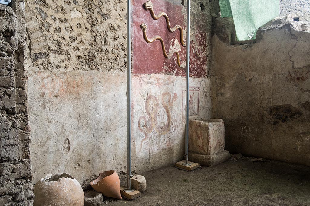 IX.10.1 Pompeii. July 2024. Room 12, looking west along south wall towards altar. Photo courtesy of Johannes Eber.