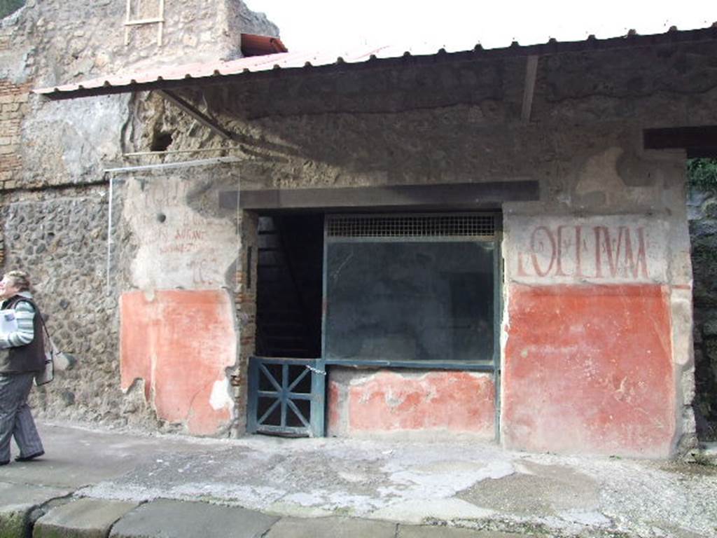 IX.11.2 Pompeii. December 2006. Entrance on Via dell’Abbondanza.
According to Cooley, found between IX.11.1 and 2, on the left of the entrance above, was the graffiti CIL IV 7862. It is no longer there.
She translates it as “I beg you to elect Cn. Helvius Sabinus aedile, worthy of public office. Aegle asks for this” See Cooley, A. and M.G.L., 2004. Pompeii : A Sourcebook. London : Routledge. (p.123, F57, where she numbers it as CIL IV 7886)
Found either to the left or right of the doorway, was CIL IV 7866, but this too is no longer there. According to Cooley, this translated as -
“I beg you to elect Cn. Helvius Sabinus aedile, worthy of public office. Maria asks for this”  See Cooley, A. and M.G.L., 2004. Pompeii : A Sourcebook. London : Routledge. (p.123)
According to Della Corte, Aegle, Maria and Zmyrina are all assumed to have been servant girls of Asellina, and are all named in the graffiti on the exterior wall. See Della Corte, M., 1965.  Case ed Abitanti di Pompei. Napoli: Fausto Fiorentino.    (p.308)
According to Epigraphik-Datenbank Clauss/Slaby (See www.manfredclauss.de), these  read –
Cn(aeum)  Helvium  Sabinum
aed(ilem)  d(ignum)  r(ei)  p(ublicae)  o(ro)  v(os)  f(aciatis)   Aegle  rogat      [CIL IV 7862]
Cn(aeum)  Helvium  Sabinum
aed(ilem)  d(ignum)  r(ei)  p(ublicae)  o(ro)  v(os)  f(aciatis)   Maria rogat       [CIL IV 7866]

