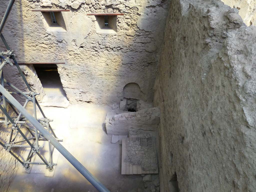 IX.12.9 Pompeii. May 2010. Room 1, east side, with latrine in south-east corner.