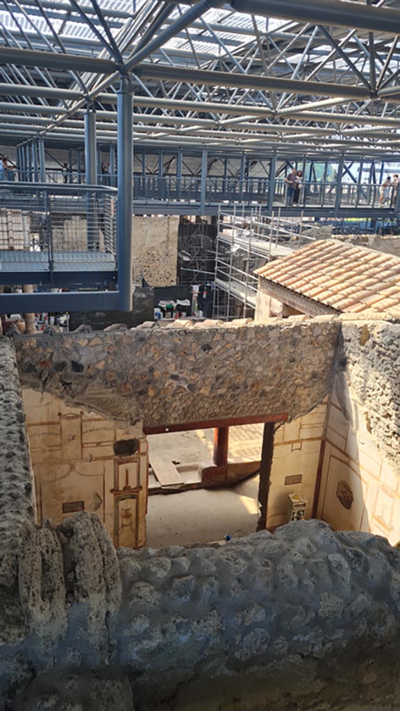 IX.12.9 Pompeii. June 2024. 
Looking south towards room 13, from above. Photo courtesy of Giuseppe Ciaramella.

