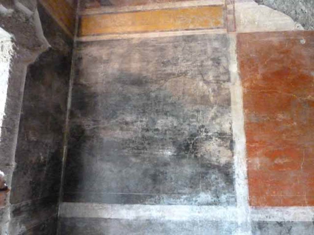 IX.13.1-3 Pompeii. May 2010.  Room 13, west wall in south west corner.