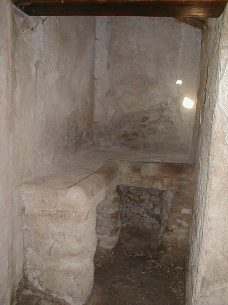 IX.13.1-3 Pompeii. September 2004. Room 23. Kitchen hearth.