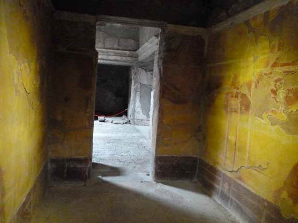 IX.13.1-3 Pompeii. May 2010.  Room 26, looking east through window in west wall.