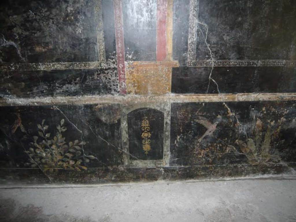 IX.13.1-3 Pompeii. May 2012.  Room 10, zoccolo of east wall with detail of two panels with birds and plants. Photo courtesy of Buzz Ferebee.
