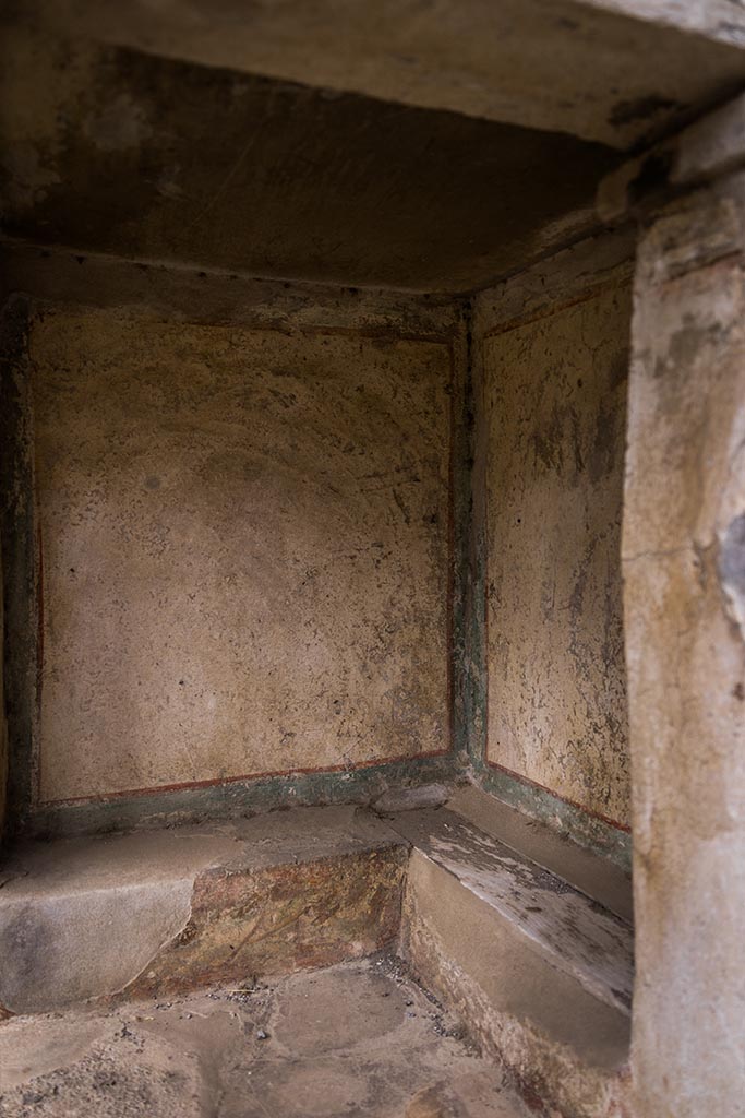 IX.14.4 Pompeii. July 2024. 
Looking towards west wall of lararium. Photo courtesy of Johannes Eber.
